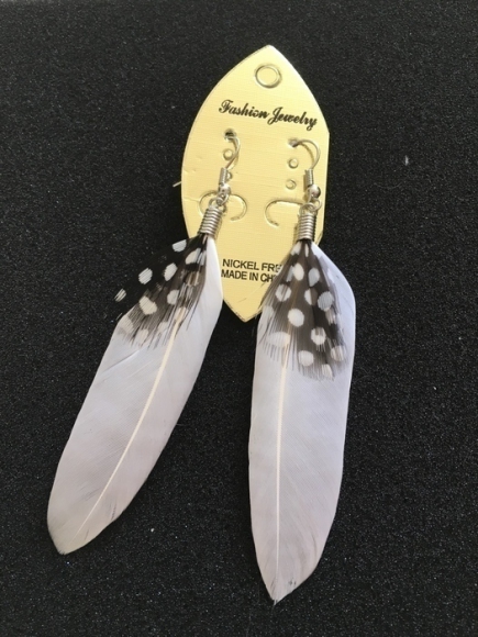 Boucles d'oreilles pendantes avec plumes blanches acheter vendre
