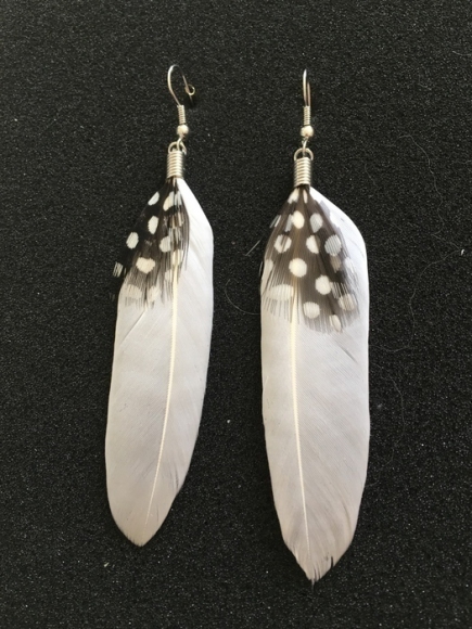 Boucles d'oreilles pendantes avec plumes blanches acheter vendre