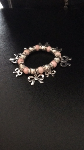 Bracelet fantaisie argenté et rose acheter vendre